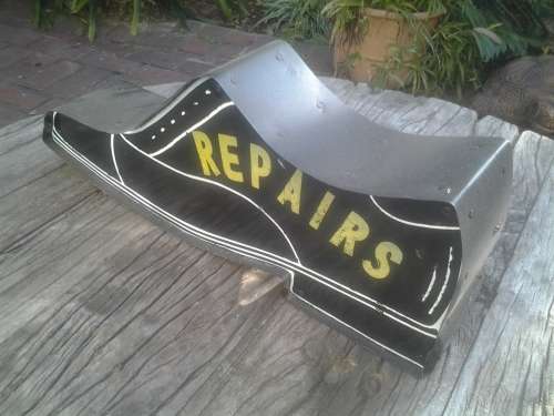 vintage shoe repair sign